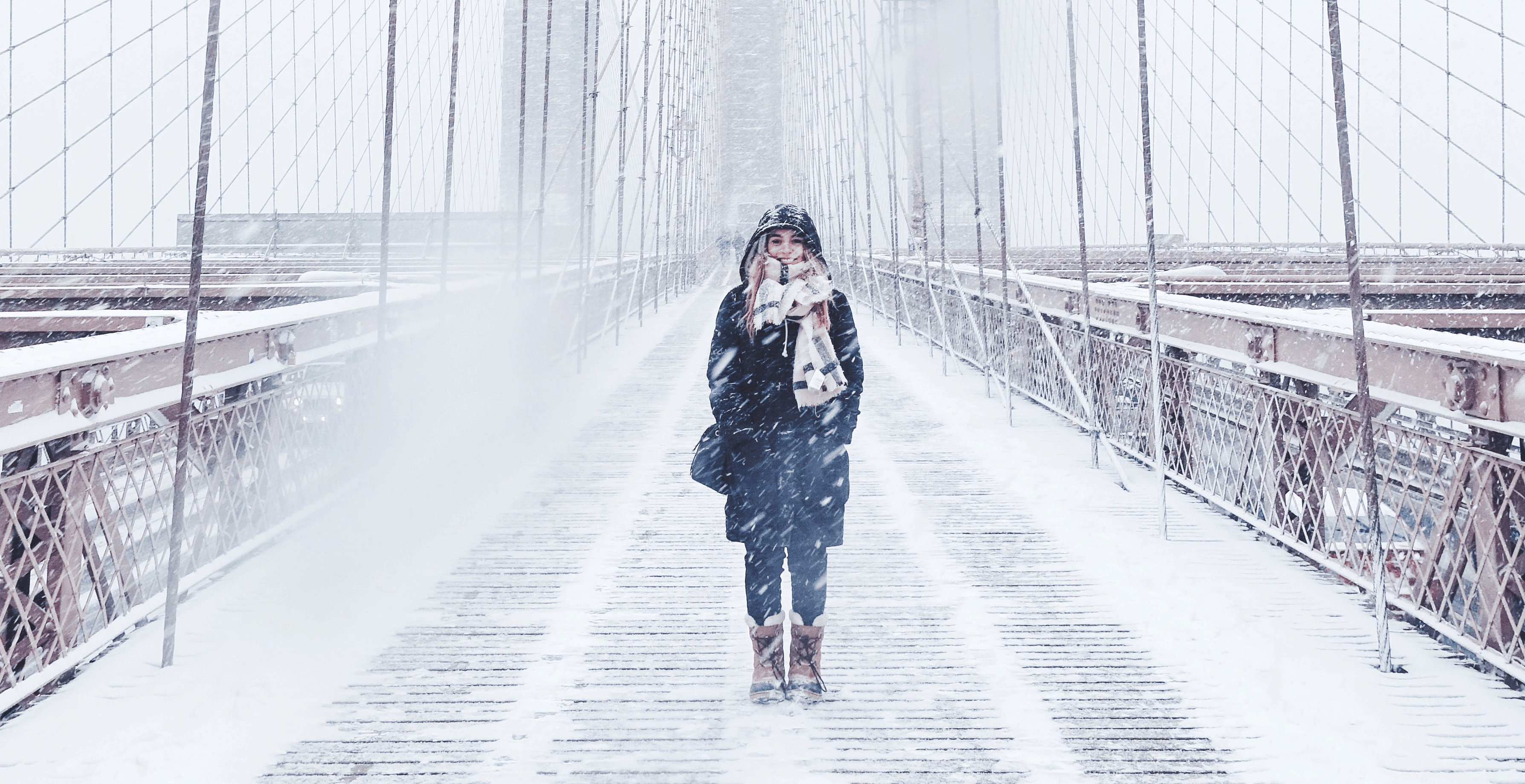 Woman in snow falling Winter Blues for Christian Women