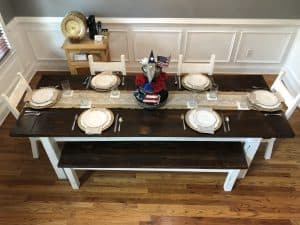 Dining room table set and decorated for Fourth of July 