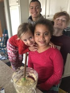 my kids helping me spread joy on my birthday by baking for others