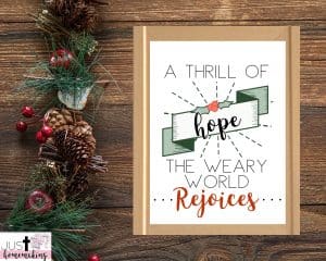 Christmas wall decor printable that reads "a thrill of hope the weary world rejoices"