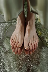 Photo of bare feet after being washed.