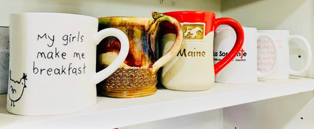 Decluttering for Christmas - image of coffe mugs organized