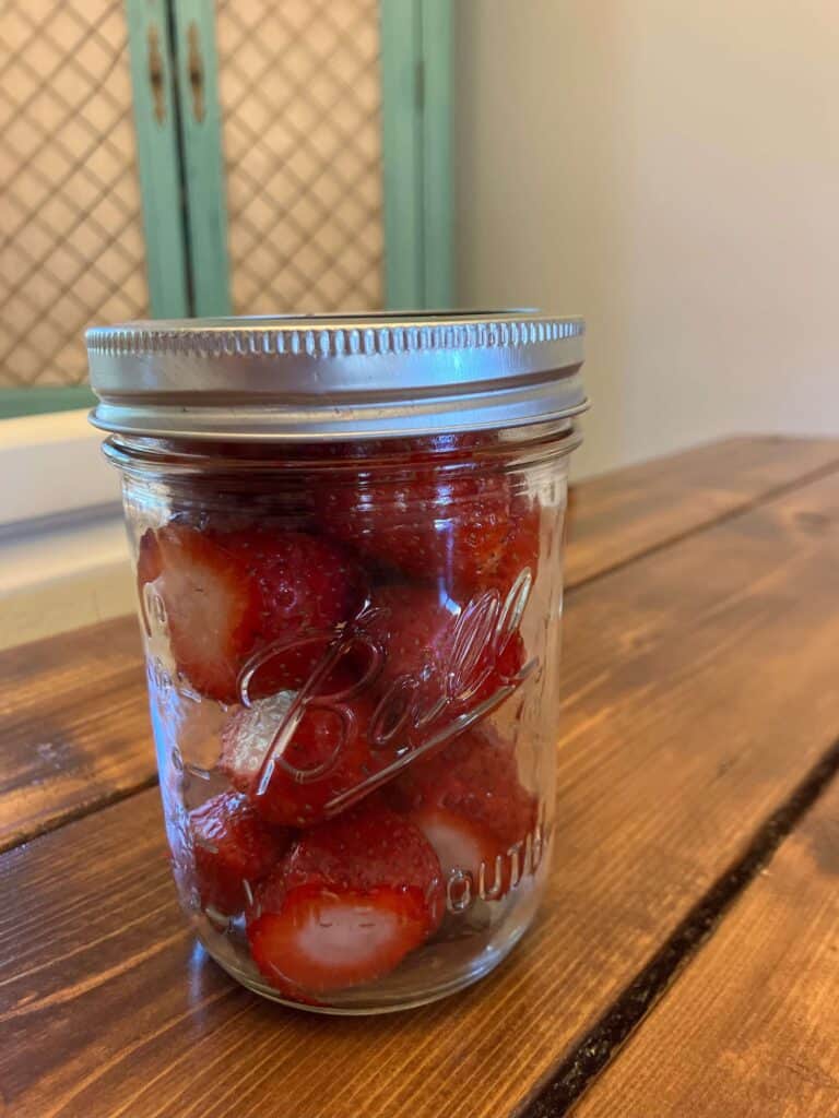 Strawberries in mason jar for longer storage