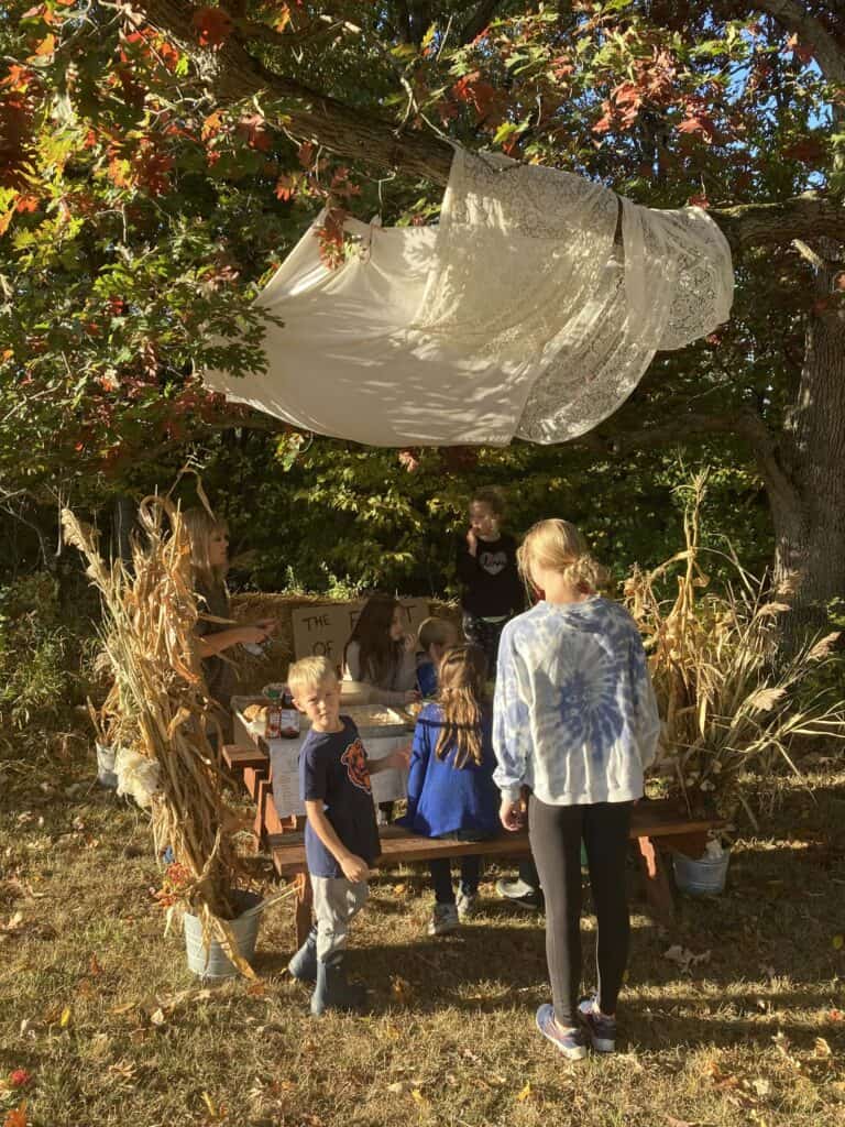 Beautiful white material hung from trees to make a Temporary Dwelling for celebrating the Feast of Tabernacles