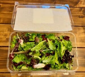 Salad with paper towel liner for groceries on a budget