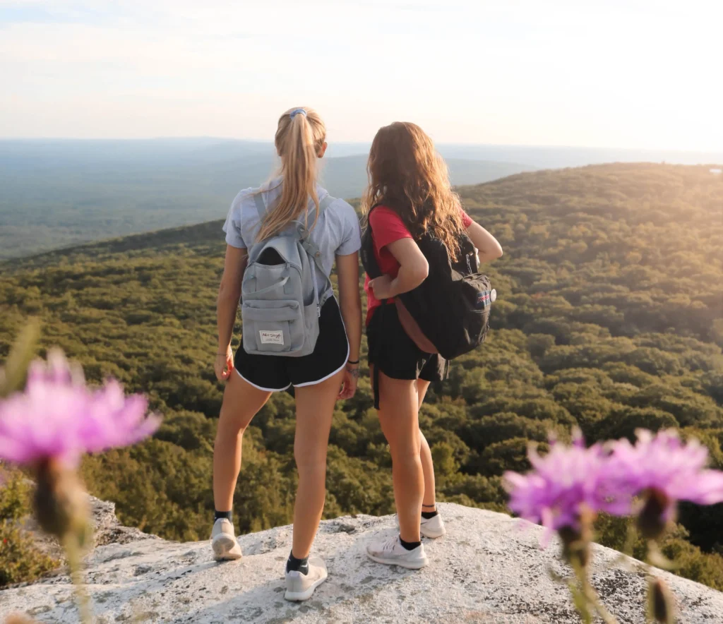 Women hiking together to get movement.