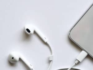 Headphones and phone- Time saving tip for busy moms- listening to audiobook while cooking and cleaning