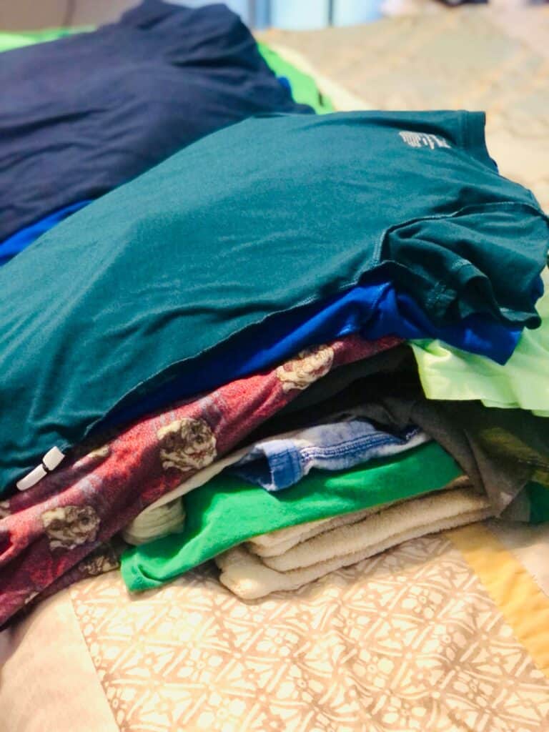 Laundry hacks for busy moms: Stop folding clothes.

(photo of two neatly-laid piles of clothes)