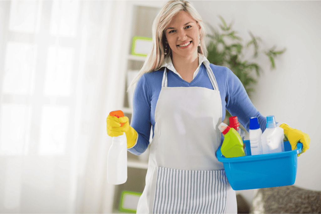 Woman with the benefits of a cleaning schedule for Homemakers