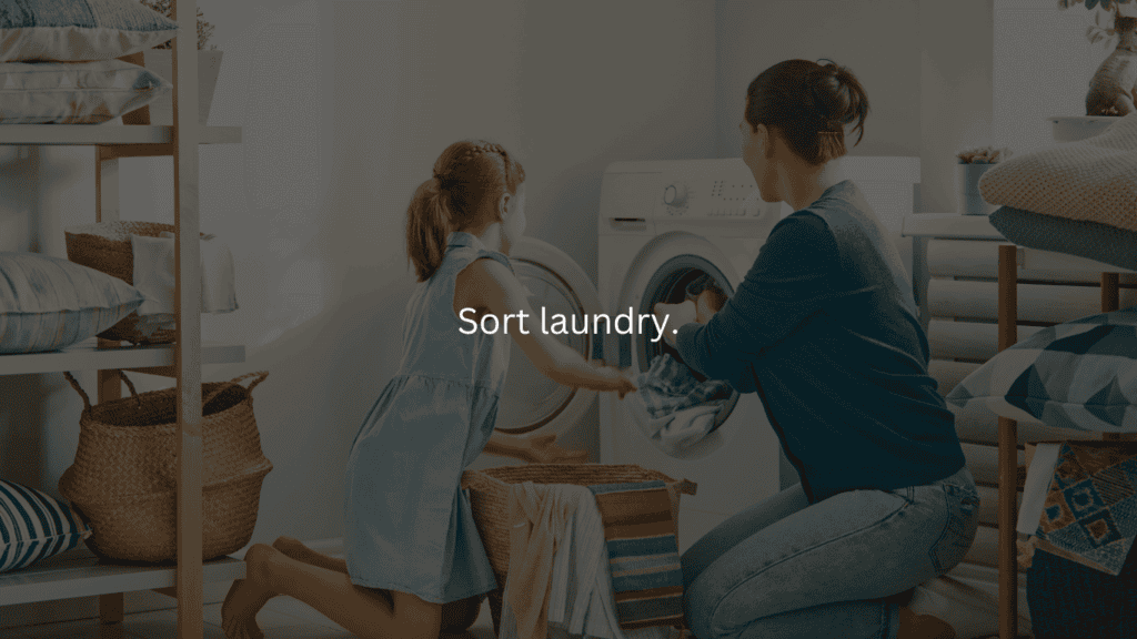 Nightly cleaning routine: sort laundry. Mom and daughter loading laundry into washing machine. 